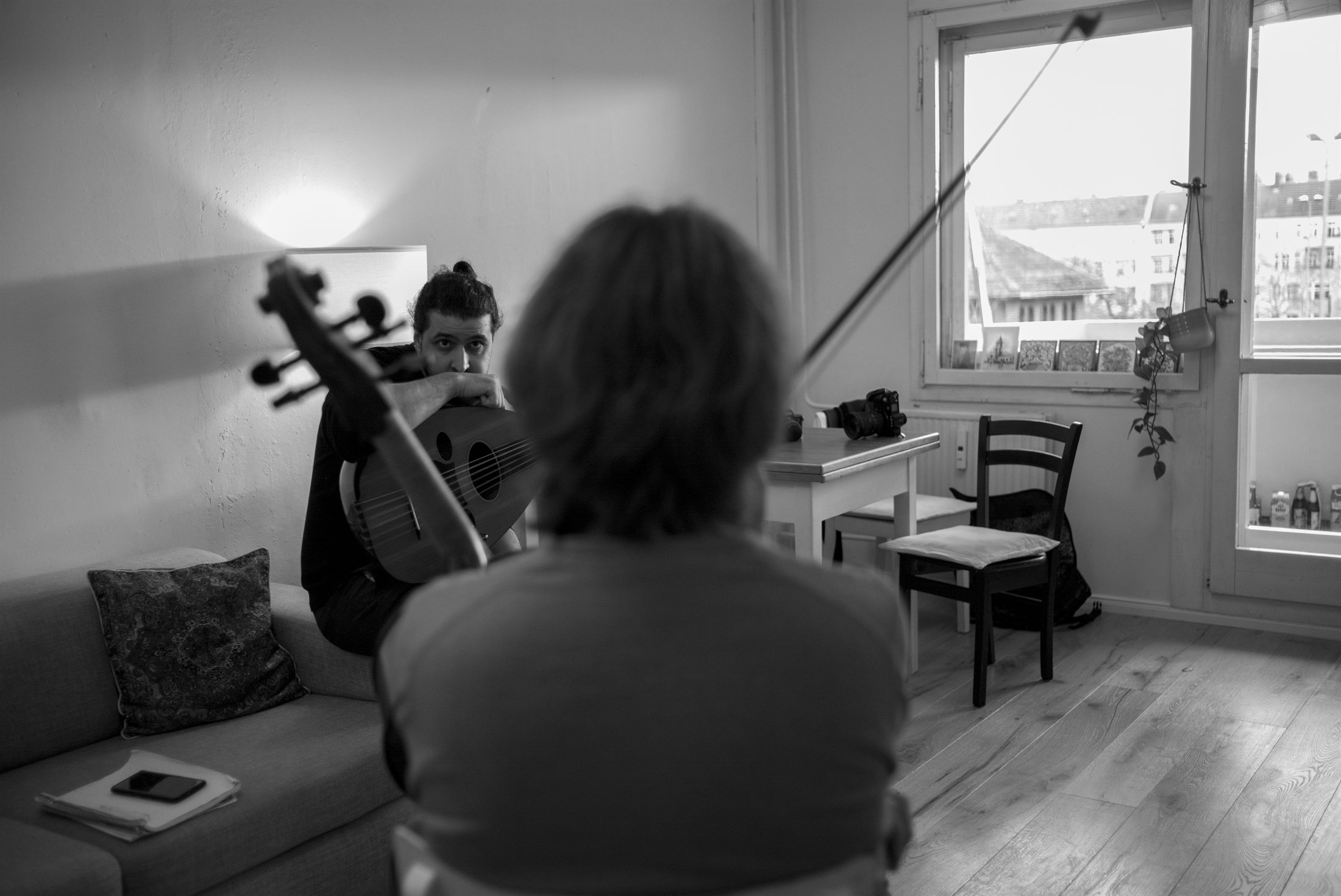 Sufian and Plush Rebel rehearsing in a bright room